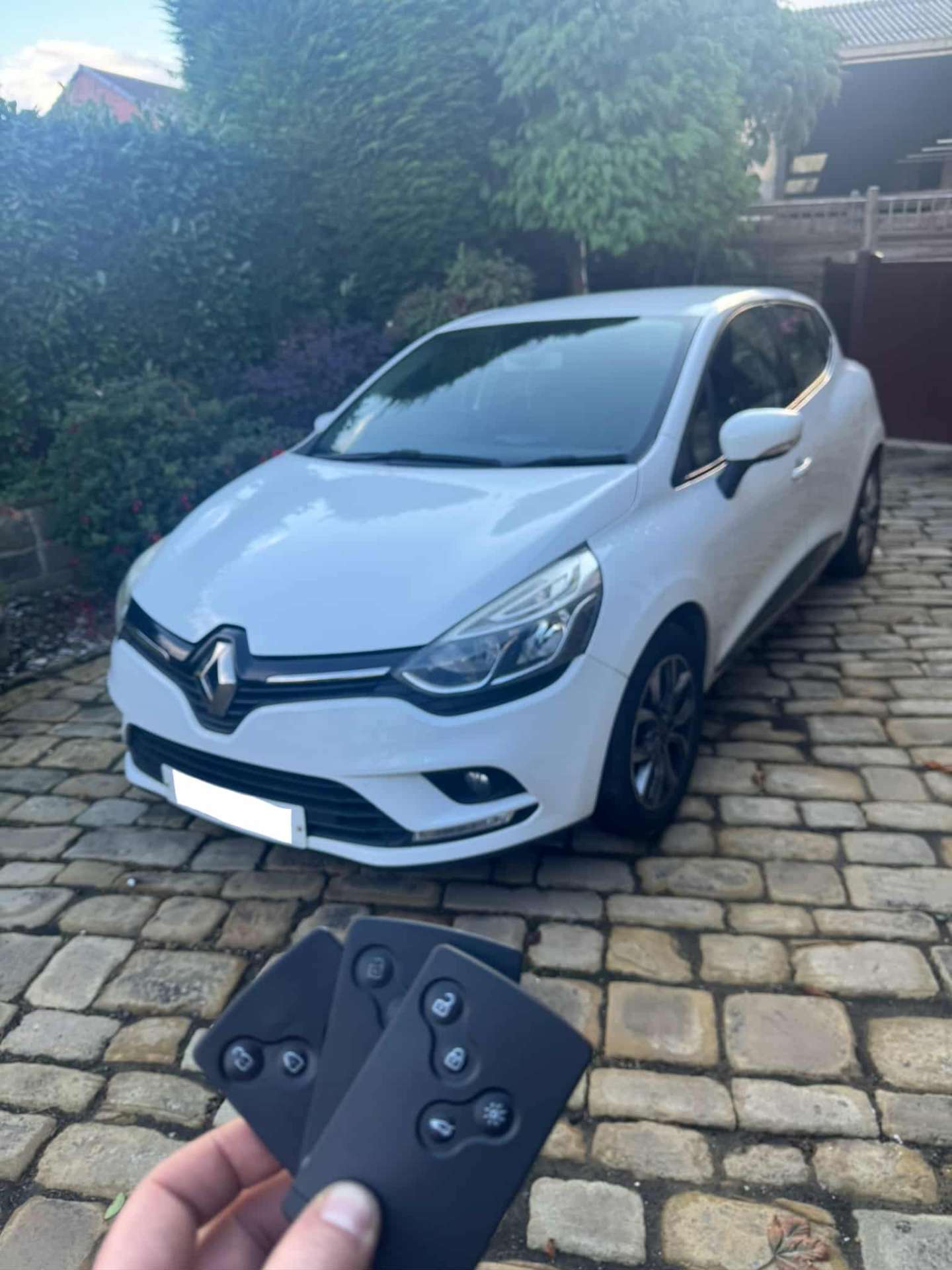 Renault Clio with three replacement keycards