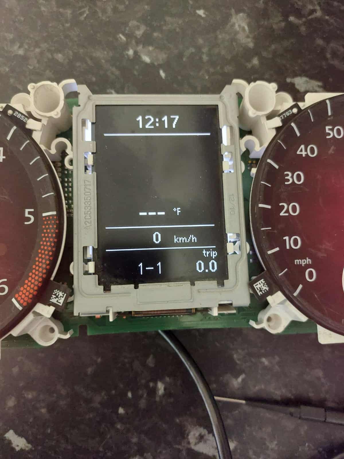 Instrument cluster removed on the bench for key coding